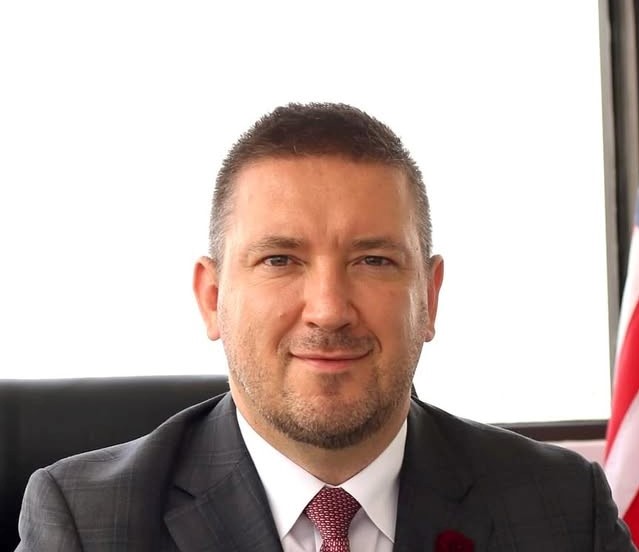 Kenneth E. Dent